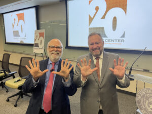Rosental Alves and Jay Bernhardt celebrate 20 years of the Knight Center.