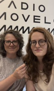 Two women wearing glasses looking into camera